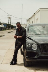 Male model Emanuel Jones, Jr. stepping out a Bentley for a photo-shoot in Dallas, Texas.