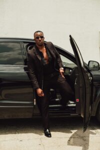 Male model Emanuel Jones, Jr. stepping out a Bentley for a photo-shoot in Dallas, Texas.